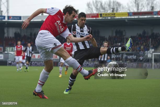 Dirk Marcellis of AZ, Everton Ramos da Silva of Heracles Almelo during the Dutch Eredivisie match between Heracles Almelo and AZ Alkmaar at the...