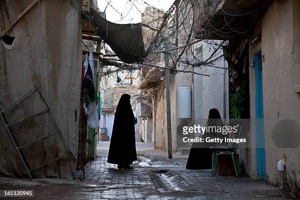 Women pictured in the area of al Shawaka on March 29, 2013 in Baghdad, Iraq. Ten years after the regime of Saddam Hussein was toppled from power,...