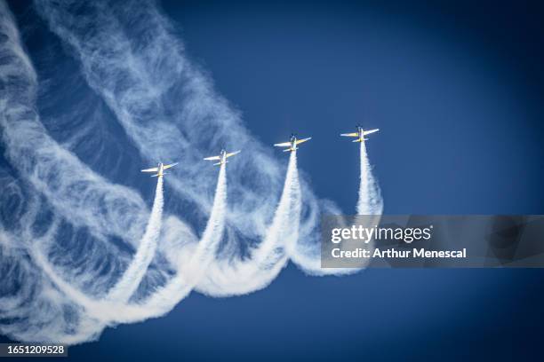 Brazilians Air Force planes from the Esquadrilha da Fumaça perform during a commemorative parade to celebrate Brazil's 201st independence anniversary...