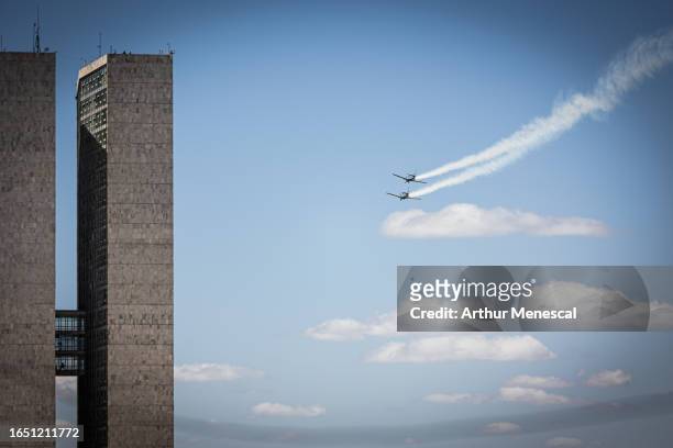 Brazilians Air Force planes from the Esquadrilha da Fumaça perform during a commemorative parade to celebrate Brazil's 201st independence anniversary...