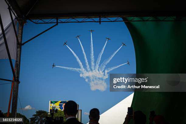 Brazilians Air Force planes from the Esquadrilha da Fumaça perform during a commemorative parade to celebrate Brazil's 201st independence anniversary...