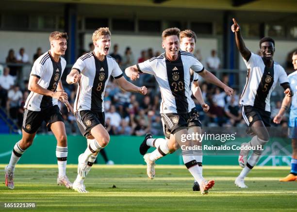 Marius Wörl of Germany celebrates scoring his side's first goal during the Under-20 friendly match between Germany and Italy at Stadion am Wurfplatz...