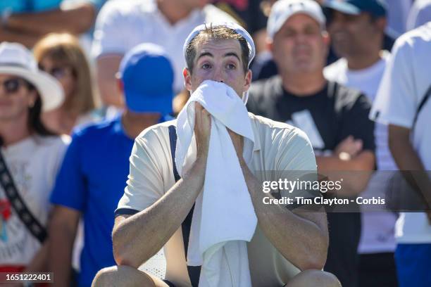 August 31: A distraught John Isner of the United States after his five-set tiebreak loss to Michael Mmoh of the United States in the Men's Singles...