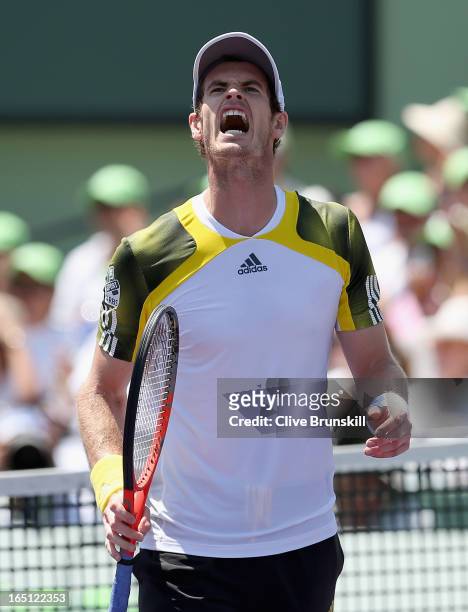 Andy Murray of Great Britain shows his frustrations on the way to winning the second set against David Ferrer of Spain during their final match at...