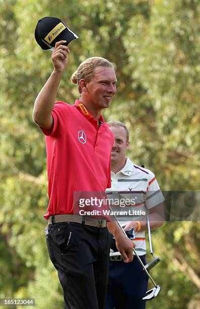 Marcel Siem of Germany celebrates winning the Trophee du Hassan II Golf on a score of -17 under par at Golf du Palais Royal on March 31, 2013 in...