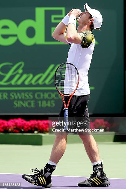 Andy Murray of Great Britain celebrates match point against David Ferrer of Spain during the final of the Sony Open at Crandon Park Tennis Center on...