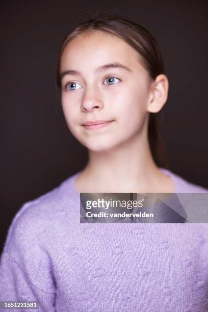 portrait of a brunette with blue eyes - purple lilac stock pictures, royalty-free photos & images