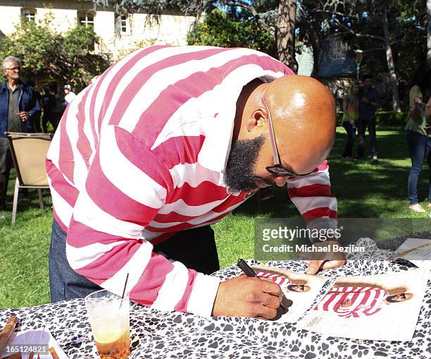 Music producer Suge Knight autographs his "Hero Shot" at Posing Heroes, "A Dog Day Afternoon" Benefiting A Wish For Animals on March 30, 2013 in Los...