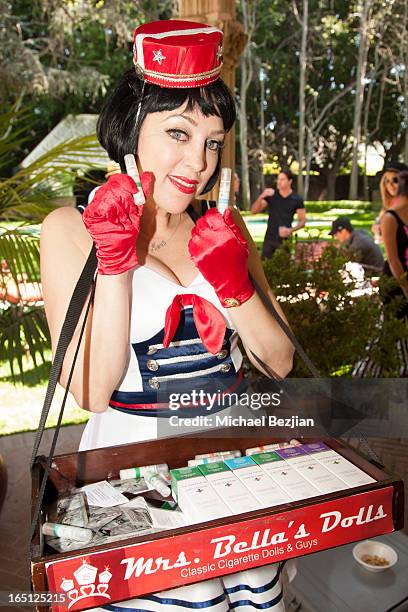 Mrs. Bella's Dolls pass out gifts and refreshments at Posing Heroes, "A Dog Day Afternoon" Benefiting A Wish For Animals on March 30, 2013 in Los...