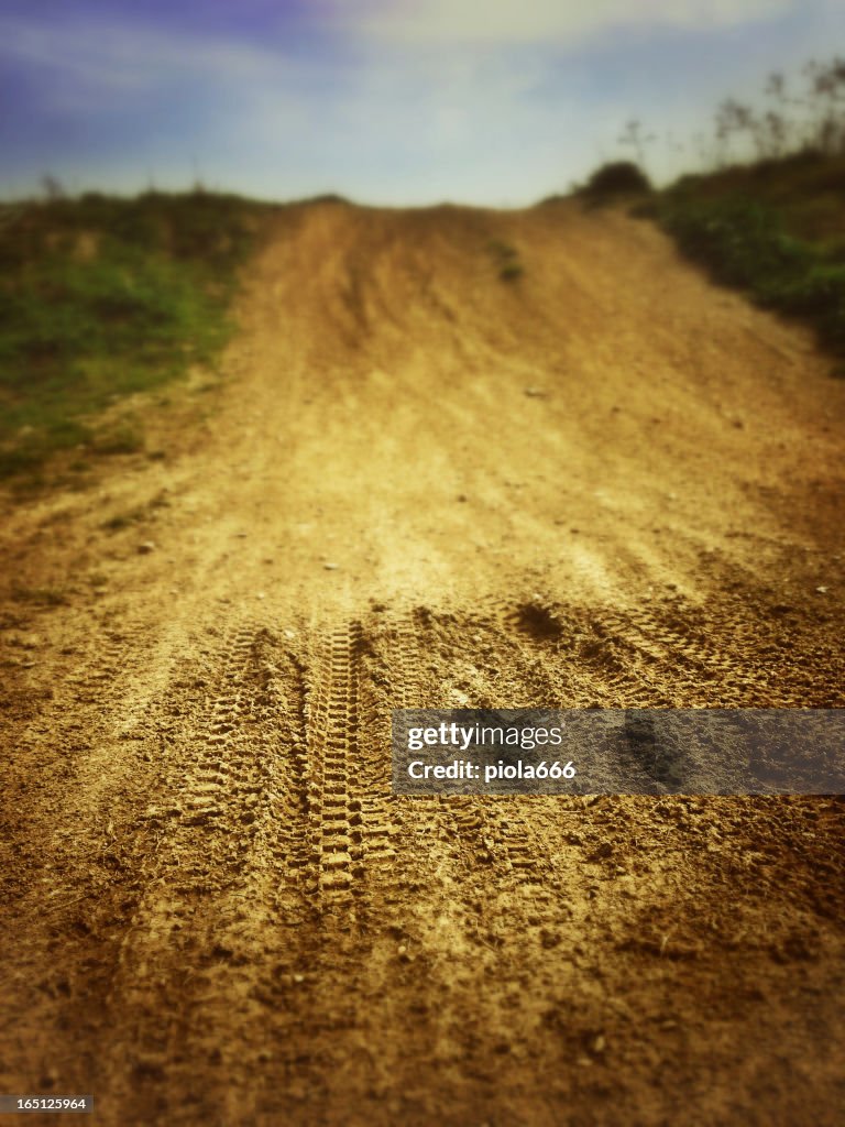 Motocross Tire Track on Muddy Ground