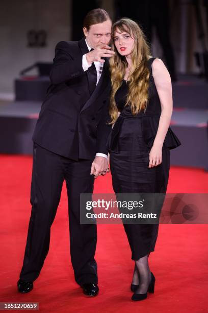 Caleb Landry Jones and partner Katya Zvereva attend a red carpet for the movie "Dogman" at the 80th Venice International Film Festival on August 31,...