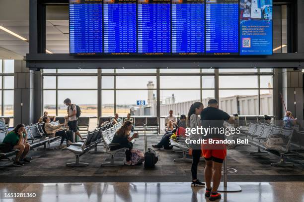 People wait for their plane departure at the Austin-Bergstrom International Airport on August 31, 2023 in Austin, Texas. The FAA has projected...