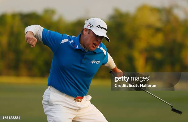 Points celebrates his par putt on the 18th green during the final round of the Shell Houston Open at the Redstone Golf Club on March 31, 2013 in...