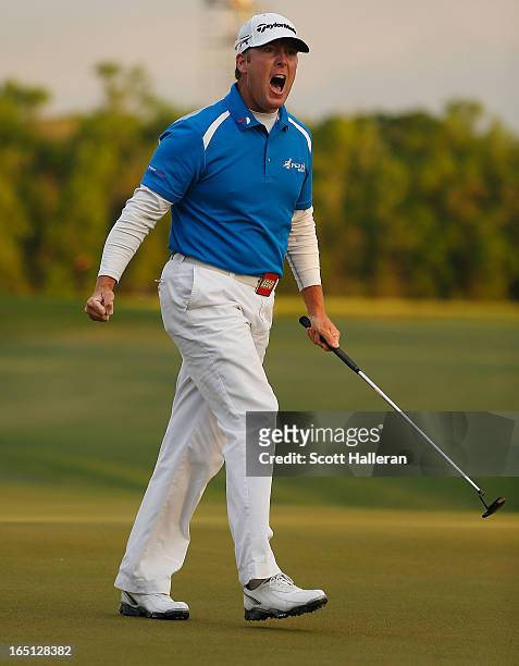 Points celebrates his par putt on the 18th green during the final round of the Shell Houston Open at the Redstone Golf Club on March 31, 2013 in...