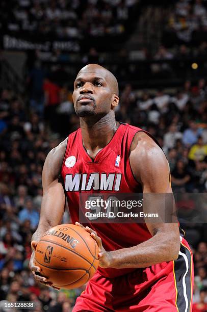 Joel Anthony of the Miami Heat aims for a free throw during the game between the Miami Heat and the San Antonio Spurs on March 31, 2013 at the AT&T...