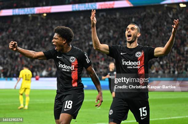 Ellyes Skhiri of Eintracht Frankfurt celebrates with Jessic Ngankam of Eintracht Frankfurt after scoring the team's second goal during the UEFA...