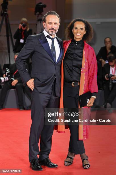 Vincent Perez and Karine Sylla attend a red carpet for the movie "Dogman" at the 80th Venice International Film Festival on August 31, 2023 in...