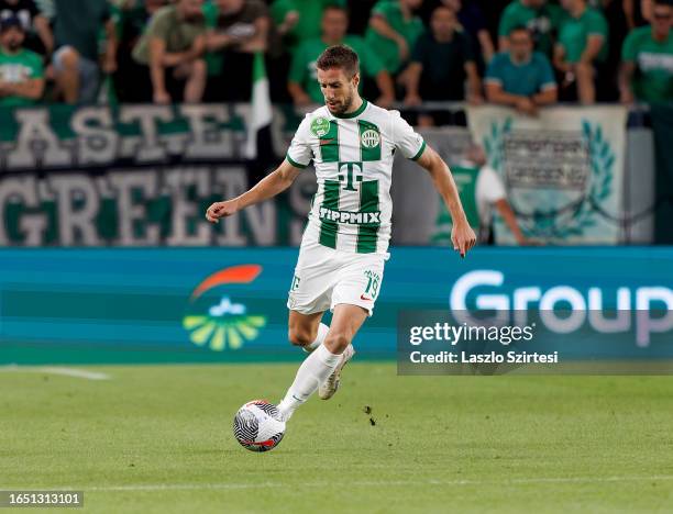 Barnabas Varga of Ferencvarosi TC runs with the ball during the UEFA Europa Conference League Play Off Round Second Leg match between Ferencvarosi TC...