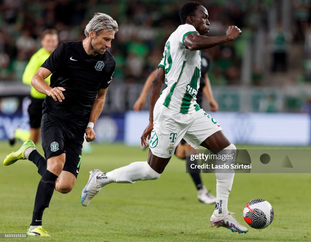 Adama Traore of Ferencvarosi TC leaves Yuri Kendysh of FK Zalgiris News  Photo - Getty Images