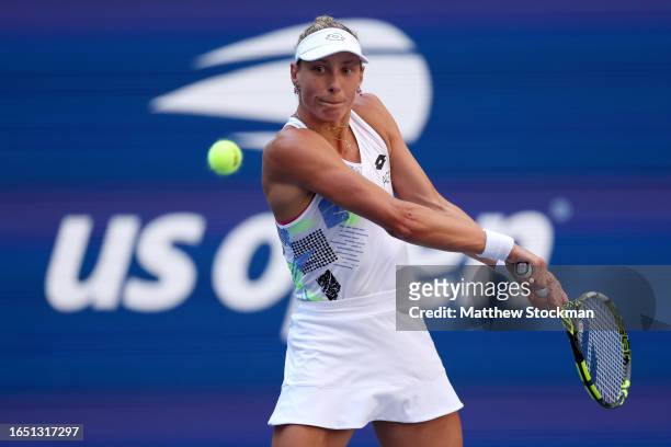 Yanina Wickmayer of Belgium returns a shot against Madison Keys of the United States during their Women's Singles Second Round match on Day Four of...