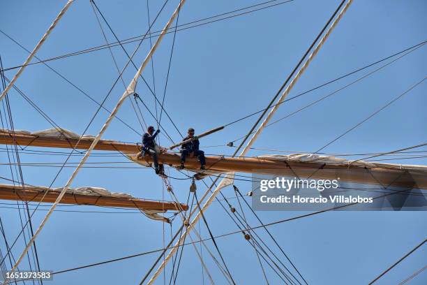 Crew members of Sea Cloud, a sailing cruise ship owned by Sea Cloud Cruises of Hamburg, Germany, and launched in 1931 as a private yacht the owner of...