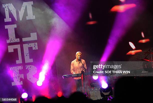 This picture taken late on March 31, 2013 shows lead vocalist of Danish rock band Michael Learns To Rock Jascha Richter performing during their...
