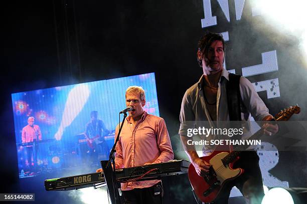This picture taken late on March 31, 2013 shows lead vocalist of Danish rock band Michael Learns To Rock Jascha Richter performing with the band...