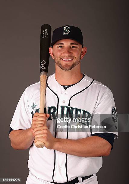 Casper Wells of the Seattle Mariners poses for a portrait during spring training photo day at Peoria Stadium on February 19, 2013 in Peoria, Arizona.