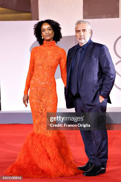 Virginie Besson-Silla and Luc Besson attend a red carpet for the movie "Dogman" at the 80th Venice International Film Festival on August 31, 2023 in...
