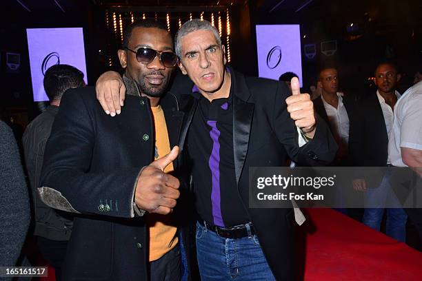 Samy Naceri and rap artist Passi attend the 'OmarJeans' Launch Party At The Pavillon Champs Elysees on March 31, 2013 in Paris, France.