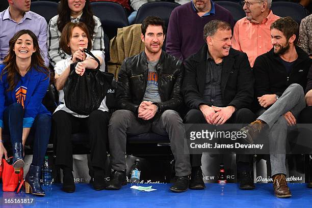 Emmy Rossum, Cheryl Rossum, Dylan McDermott, guest and Chace Crawford attend the Boston Celtics vs New York Knicks game at Madison Square Garden on...