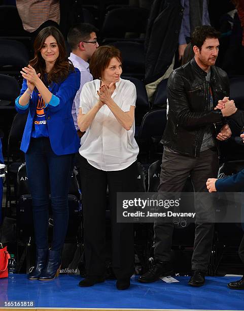 Emmy Rossum, Cheryl Rossum and Dylan McDermott attend the Boston Celtics vs New York Knicks game at Madison Square Garden on March 31, 2013 in New...