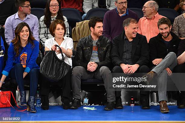 Emmy Rossum, Cheryl Rossum, Dylan McDermott, guest and Chace Crawford attend the Boston Celtics vs New York Knicks game at Madison Square Garden on...