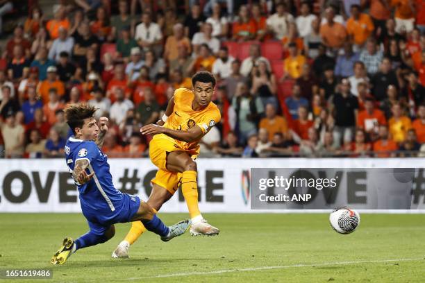 Lazaros Rota of Greece, Cody Gakpo of Holland scores the 2-0 during the European Championship Qualifying match in group B between the Netherlands and...