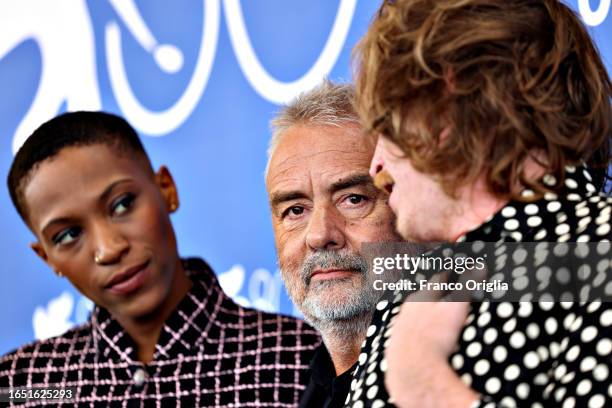 Luc Besson, Caleb Landry Jones and Jojo T. Gibbs attend a photocall for the movie "Dogman" at the 80th Venice International Film Festival on August...