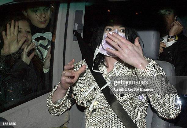 Singer Michael Jackson leaves the Adlon Hotel November 19, 2002 in Berlin. Jackson is in Berlin with his three children to accept a lifetime...