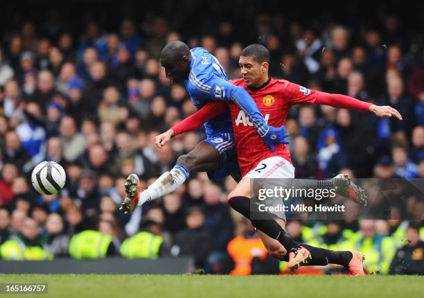 Chris Smalling of Manchester United challenges Demba Ba of Chelsea during the FA Cup with Budweiser Sixth Round Replay match between Chelsea and...