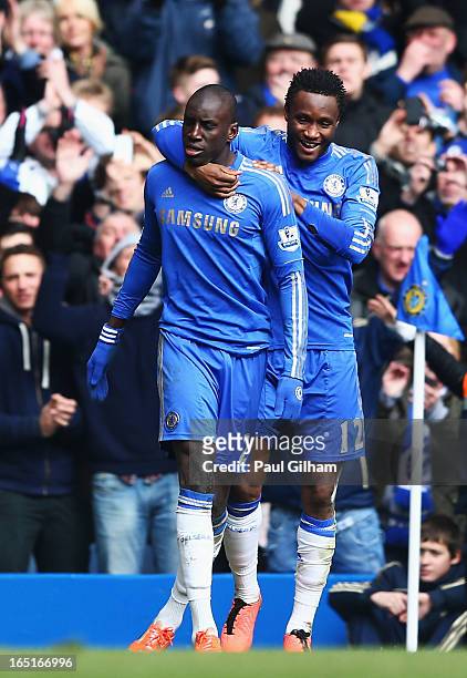 Demba Ba of Chelsea celebrates his goal with team mate Mikel during the FA Cup with Budweiser Sixth Round Replay match between Chelsea and Manchester...