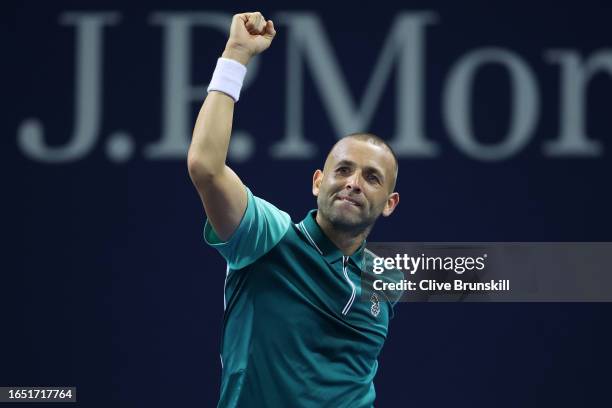 Daniel Evans of Great Britain celebrates match point against Botic Van De Zandschulp of the Netherlands during their Men's Singles Second Round match...