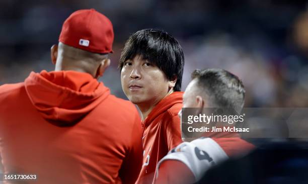 Interpreter Ippei Mizuhara of the Los Angeles Angels looks on against the New York Mets at Citi Field on August 25, 2023 in New York City. The Angels...