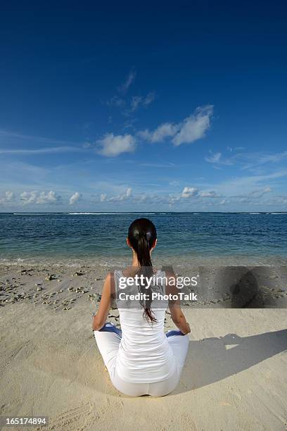 beach yoga - breathing new life stock pictures, royalty-free photos & images