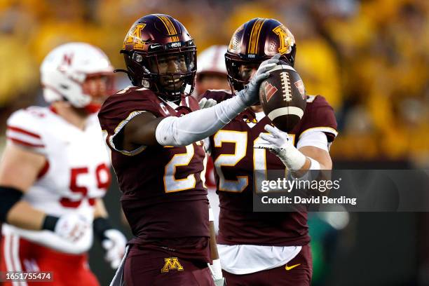 Tyler Nubin of the Minnesota Golden Gophers celebrates his interception against the Nebraska Cornhuskers in the first half at Huntington Bank Stadium...