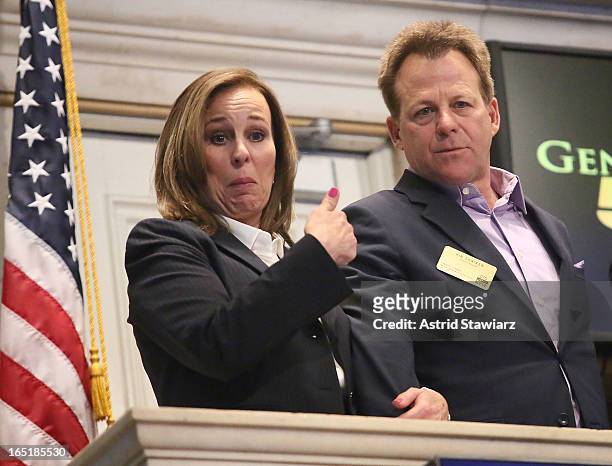 Actors Genie Francis and Kin Shriner of ABC's soap opera General Hospital ring the opening bell at the New York Stock Exchange on April 1, 2013 in...