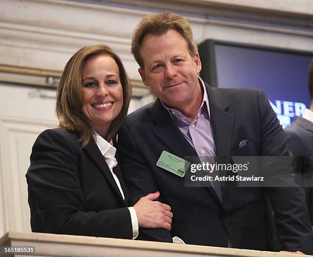 Actors Genie Francis and Kin Shriner of ABC's soap opera General Hospital ring the opening bell at the New York Stock Exchange on April 1, 2013 in...