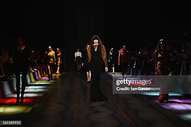 Models walk the runway at the Masha Kravtsova show during Mercedes-Benz Fashion Week Russia Fall/Winter 2013/2014 at Manege on April 1, 2013 in...