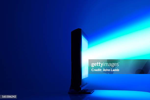 tv download - glowing tv stock pictures, royalty-free photos & images