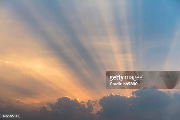 sunlight,rays of light behind clouds, - a savior is born jesus christ stock pictures, royalty-free photos & images