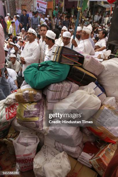 Aam Aadmi Party supporters carry 8 lakh letters claimed to be collected from Delhiites who have decided not to pay electricity bills during their...