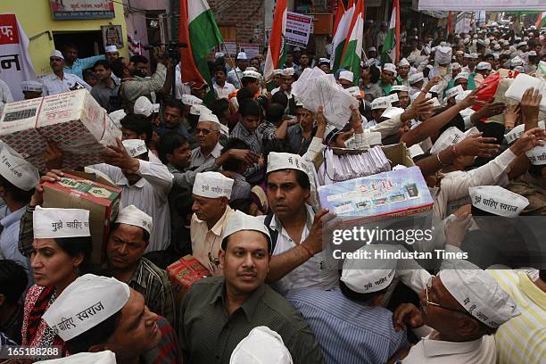 Aam Aadmi Party supporters carry 8 lakh letters claimed to be collected from Delhiites who have decided not to pay electricity bills during their...