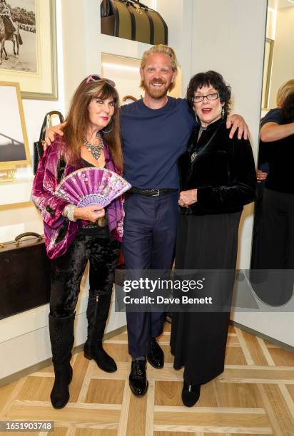 Caroline Munro, Alistair Guy and Martine Beswick attend a private view of photographer Alistair Guy's new exhibition "Incidentals 2" at House Of...